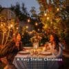Stellar Drop String Lights strung across a home pergola or garden area, creating a warm glow for outdoor entertaining