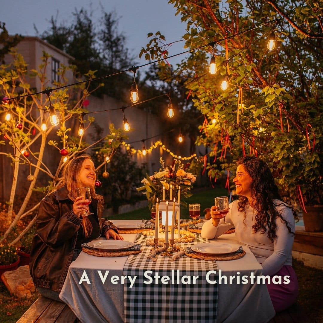 Stellar Drop String Lights strung across a home pergola or garden area, creating a warm glow for outdoor entertaining