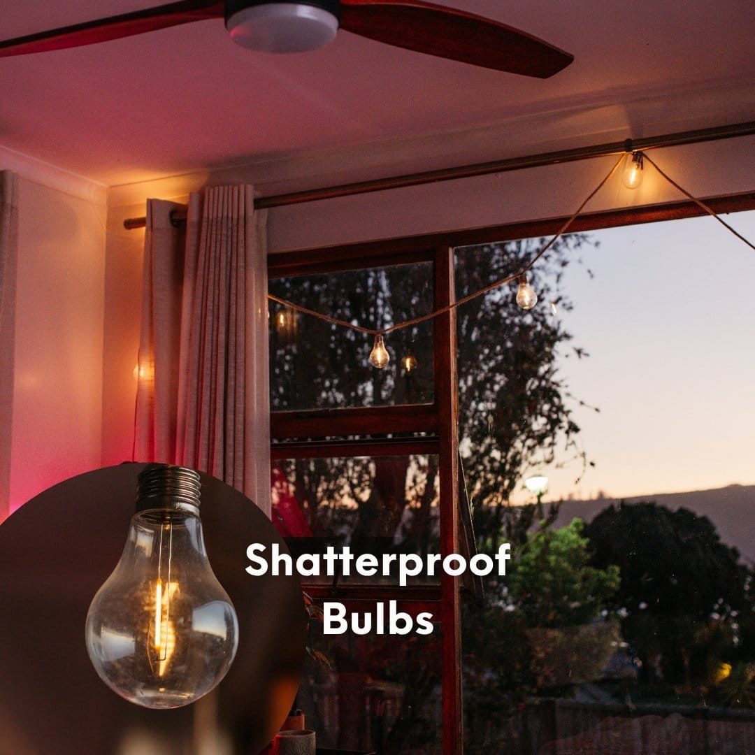 Close-up of a warm LED bulb on the cotton string lights showing the soft glow and cotton-wrapped wire