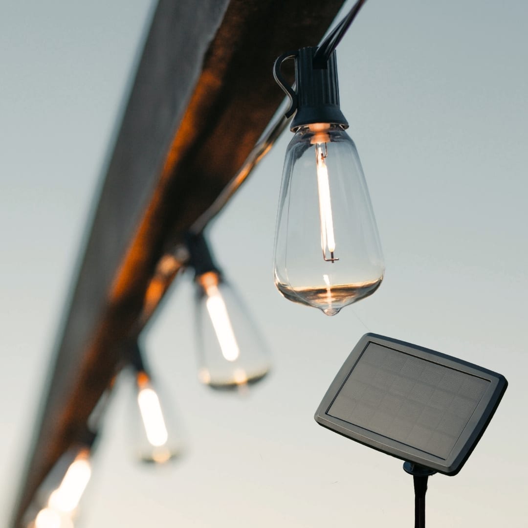 Solar 10m Vintage LED Bulb String Lights for Outdoor Use Solar-powered vintage LED string lights glowing at dusk in an outdoor setup