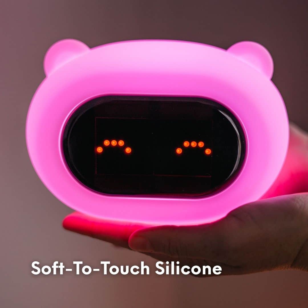 Soft LED glow from the Lighties bear night light showing warm bedtime lighting