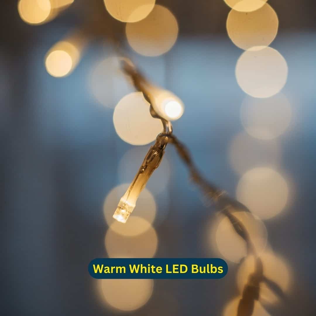 Curtain String Lights - Warm White LED Fairy Lights draped over curtain, creating a cozy atmosphere.