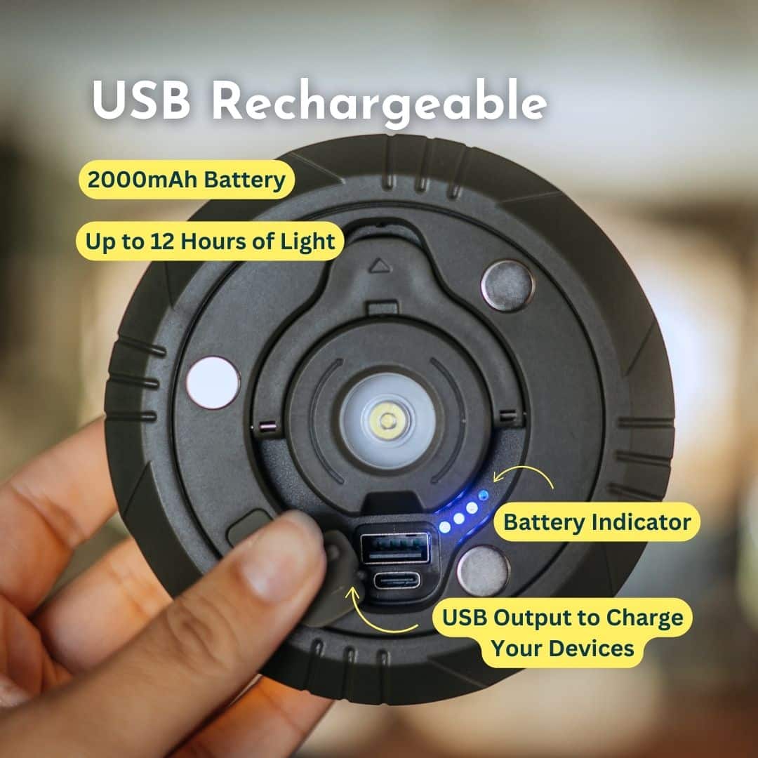 Rechargeable camping lantern with USB output and LED battery indicator lights.