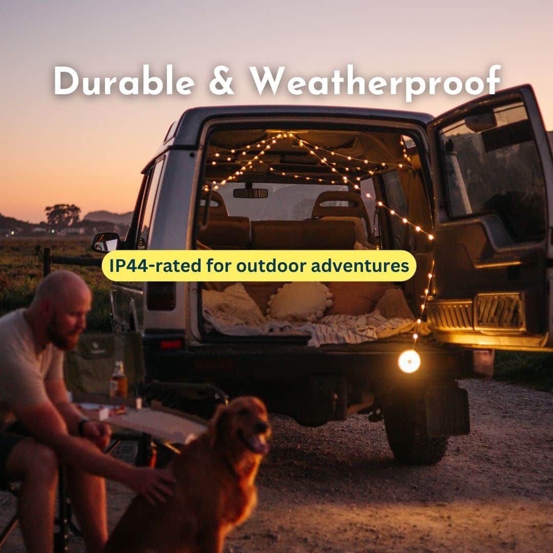 Versatile camping lantern with warm white and RGB string lights, creating a cozy outdoor atmosphere.