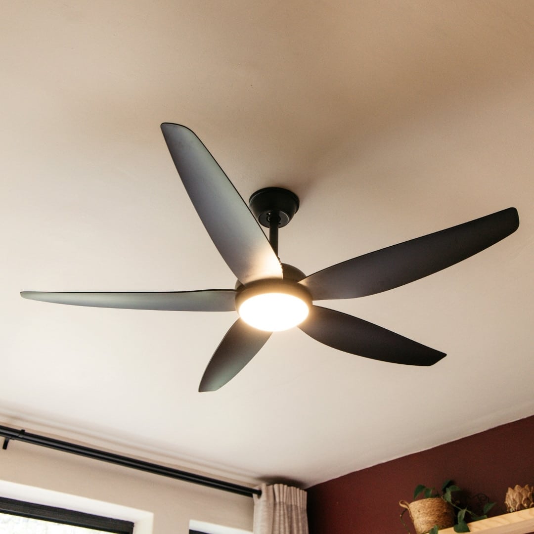 52-inch black ceiling fan with five sleek blades, remote control, and built-in light for efficient cooling and illumination.
