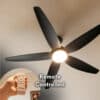 52-inch black ceiling fan with five sleek blades, remote control, and built-in light for efficient cooling and illumination.