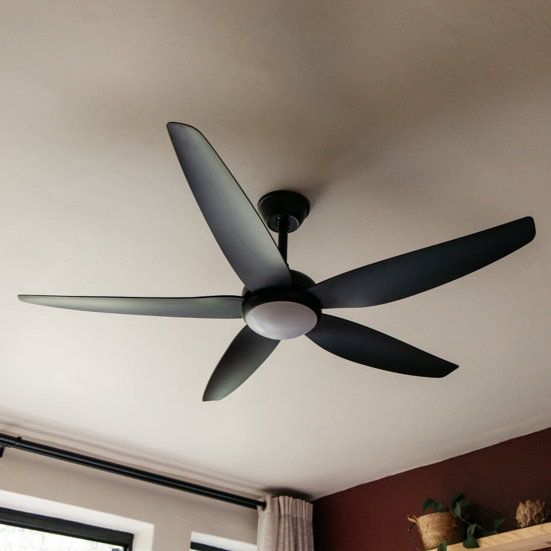 52-inch black ceiling fan with five sleek blades, remote control, and built-in light for efficient cooling and illumination.