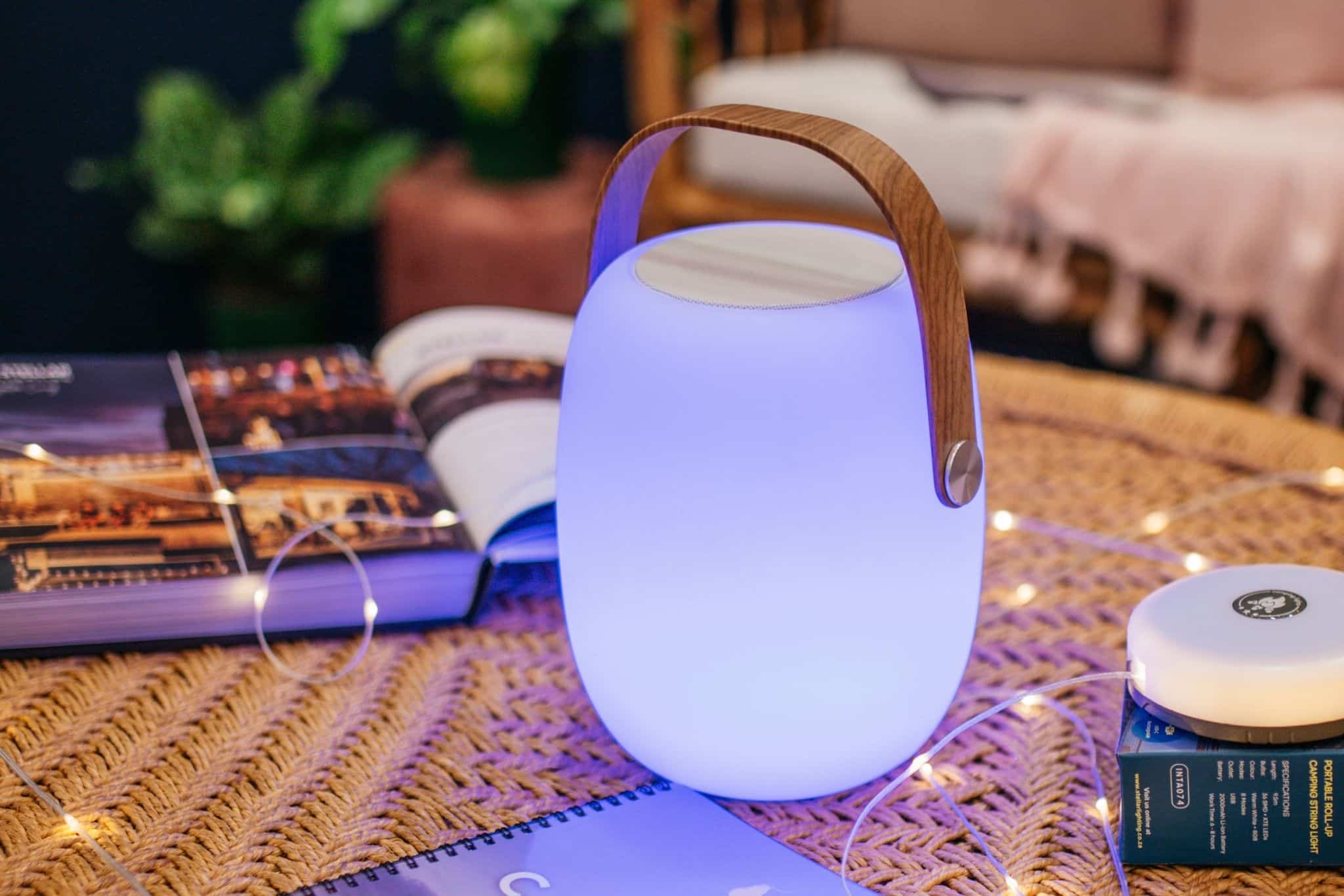 Bluetooth speaker lantern playing music at Stellar Lighting’s Decorex exhibit.