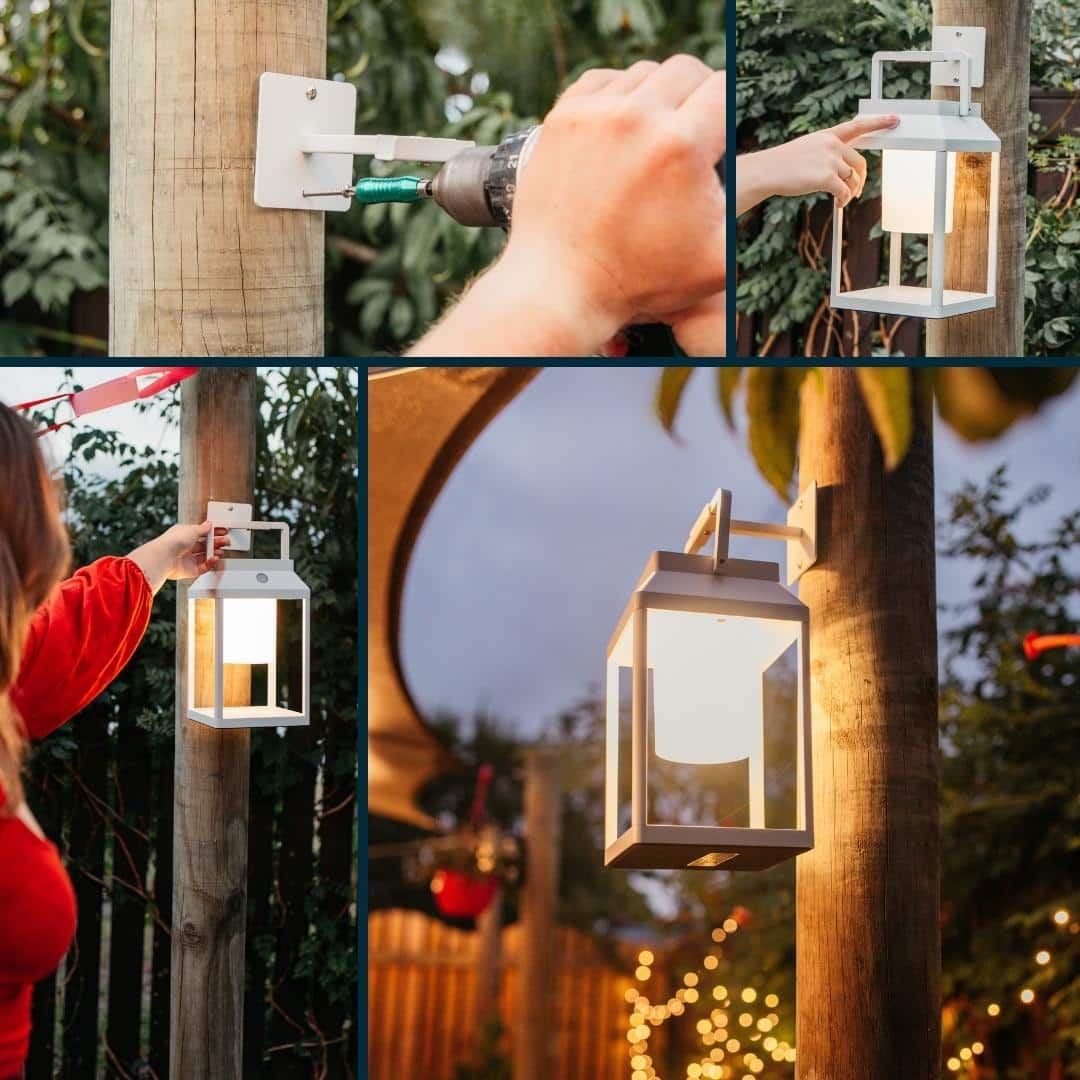 Portable white solar LED lantern on table and wall, warm light glow