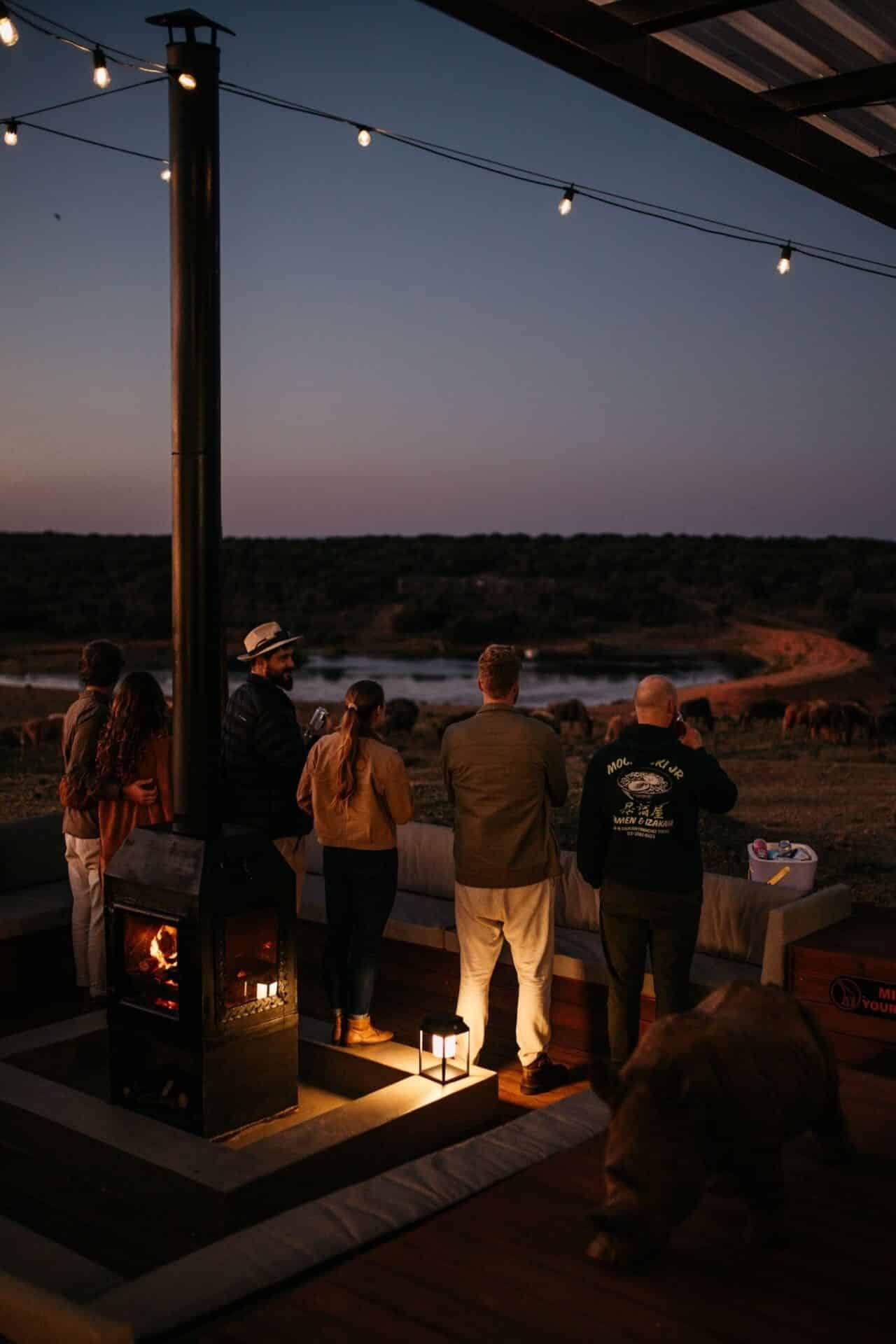 Black Solar Glow Lantern – Weatherproof Outdoor Light Black solar LED lantern mounted on outdoor wall with soft glow