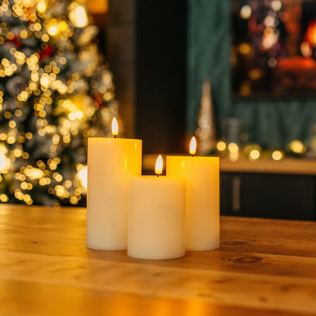 White Real Wax Flameless LED Pillar Candle Set of 3 with remote control on display