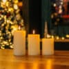 White Real Wax Flameless LED Pillar Candle Set of 3 with remote control on display
