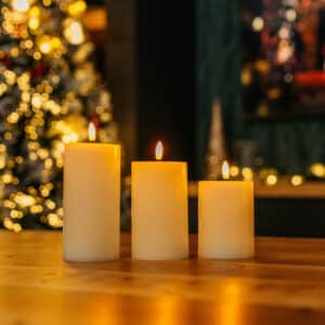 White Real Wax Flameless LED Pillar Candle Set of 3 with remote control on display