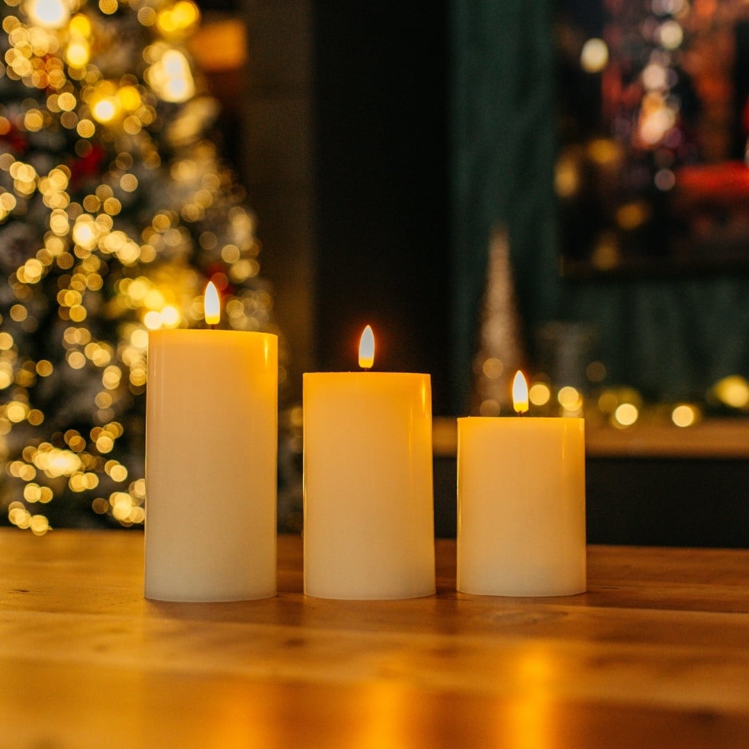 White Real Wax Flameless LED Pillar Candle Set of 3 with remote control on display