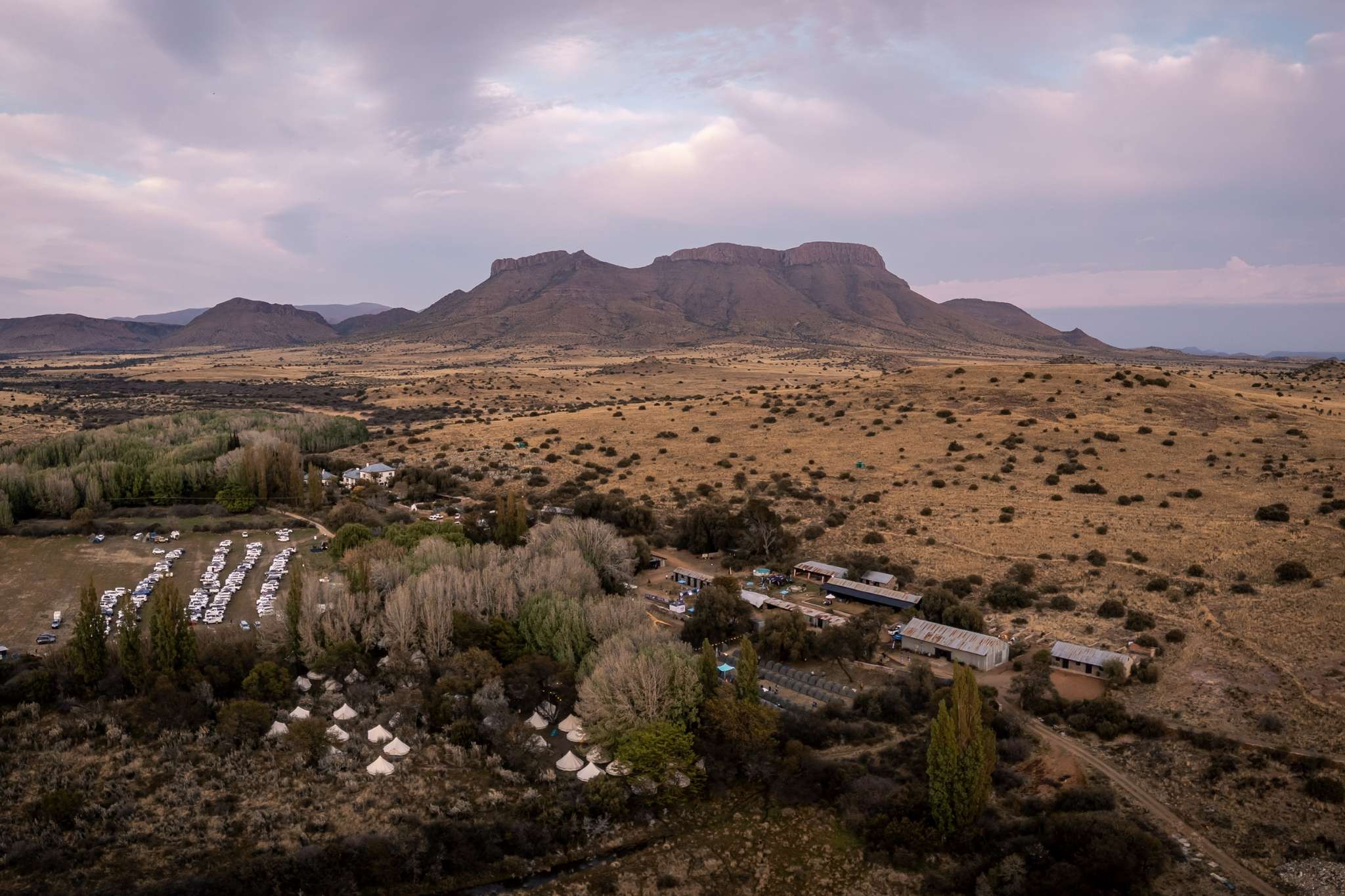 Cyclists stopping at a water point during Ride the Karoo