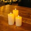 White Real Wax Flameless LED Pillar Candle Set of 3 with remote control on display