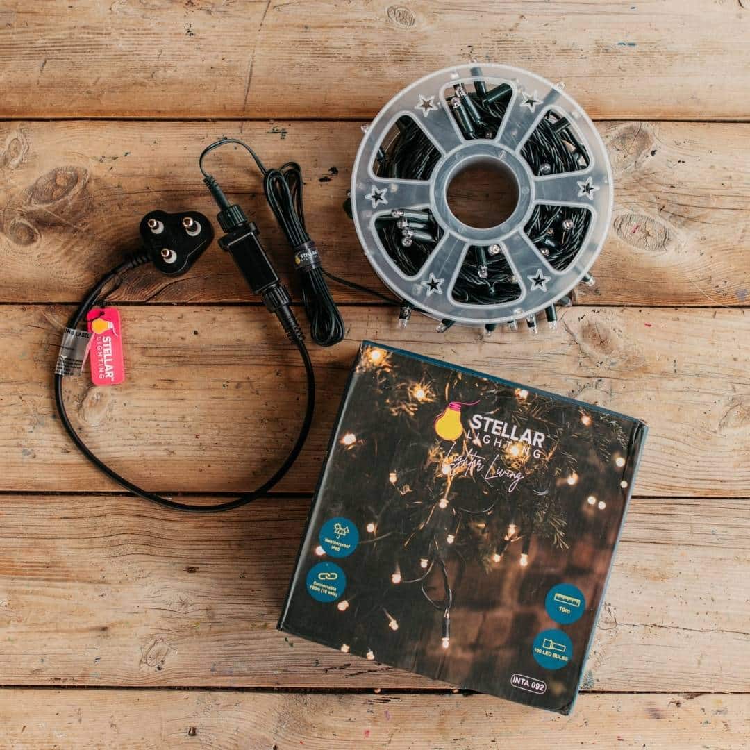 10 m heavy-duty fairy light string with 100 warm white LEDs and 3 m extension lead.