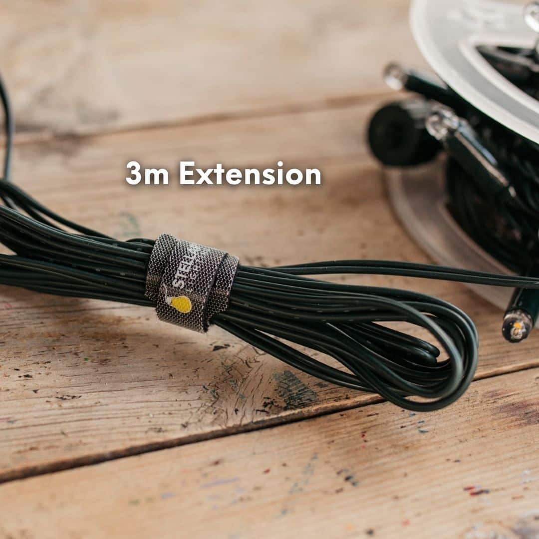 10 m heavy-duty fairy light string with 100 warm white LEDs and 3 m extension lead.