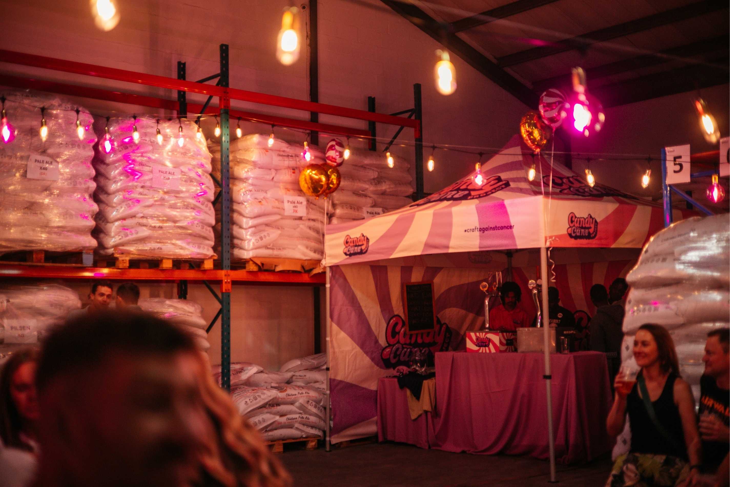 Candy Cane Projects Hazy Cane launch with guests enjoying craft beer and community spirit