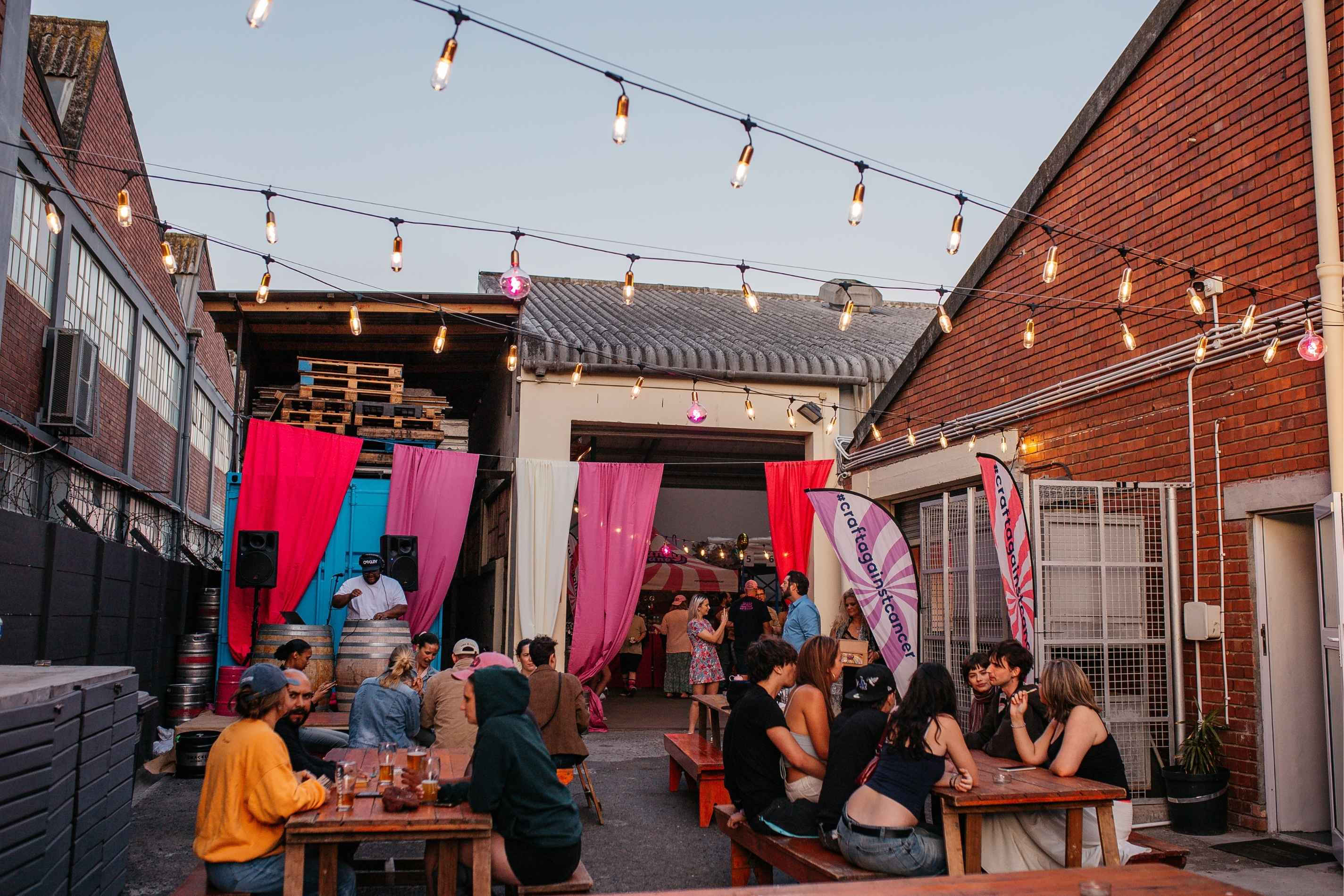 Candy Cane Projects Hazy Cane launch with guests enjoying craft beer and community spirit