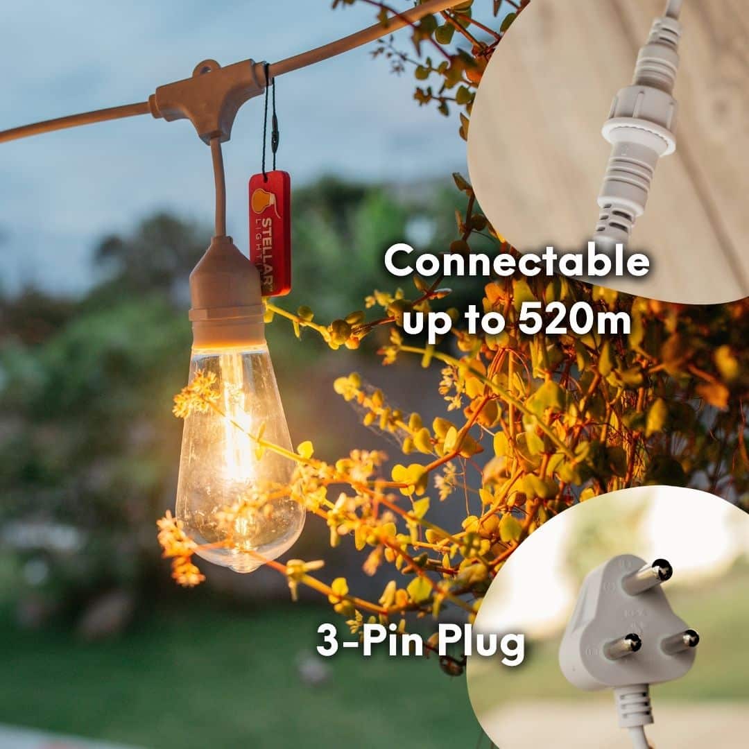 10m white festoon string lights with warm ST64 LED bulbs glowing outdoors