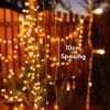 Curtain String Lights - Warm White LED Fairy Lights draped over curtain, creating a cozy atmosphere.