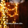 Curtain String Lights - Warm White LED Fairy Lights draped over curtain, creating a cozy atmosphere.