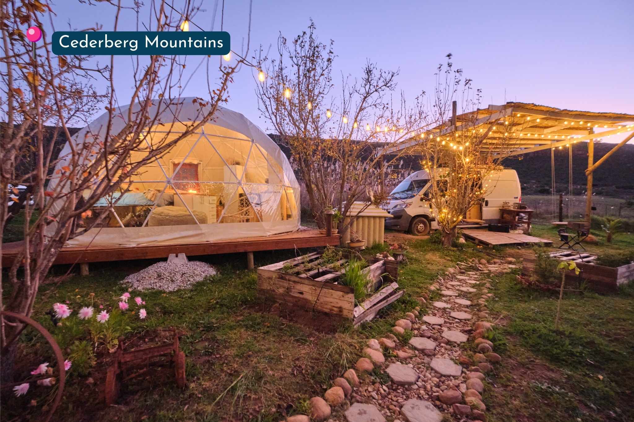 Geodesic dome on a farmstead illuminated with solar lights at night in South Africa